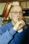 Claude enjoying a glass of his wine
